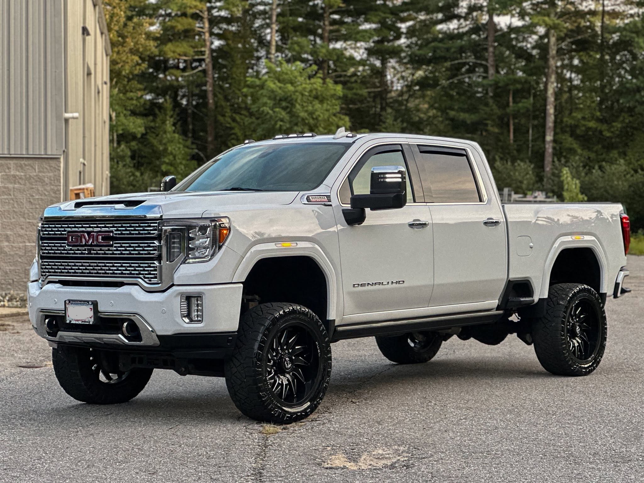 White GMC Denali after professional paint correction and ceramic coating by Midnight Detailing in Southern New Hampshire